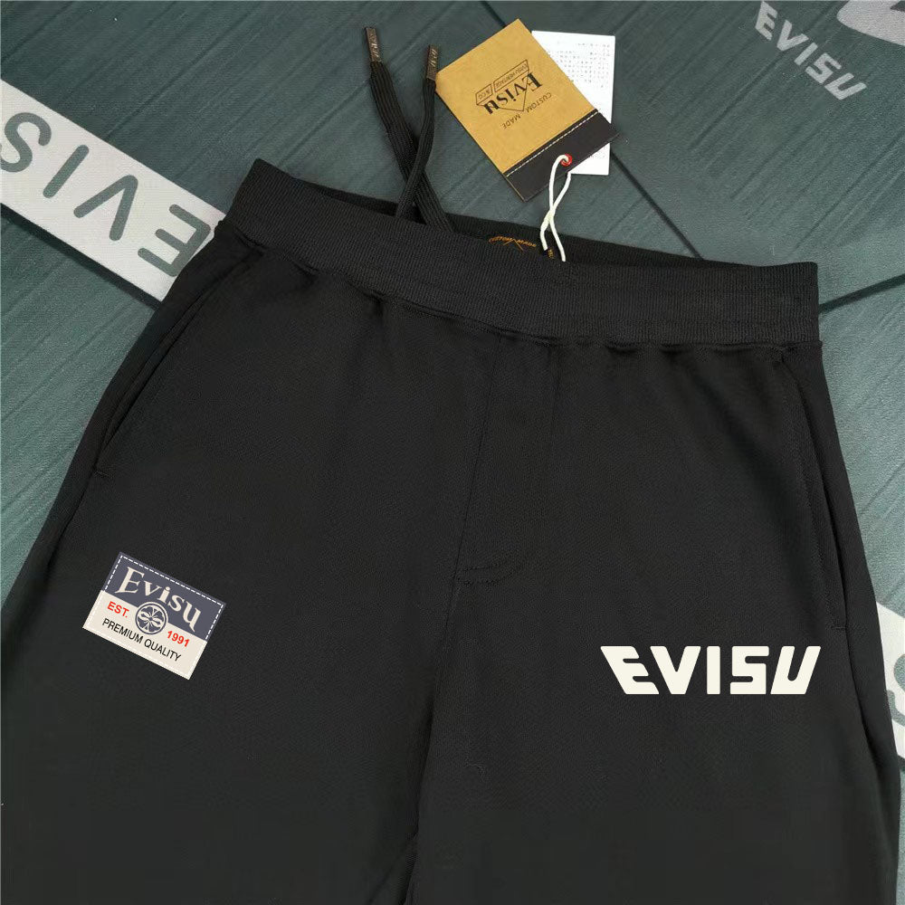 EVISU Denim Kitsune Daruma Sticker Collage M-Logo Graphic Jogger Sweatpants