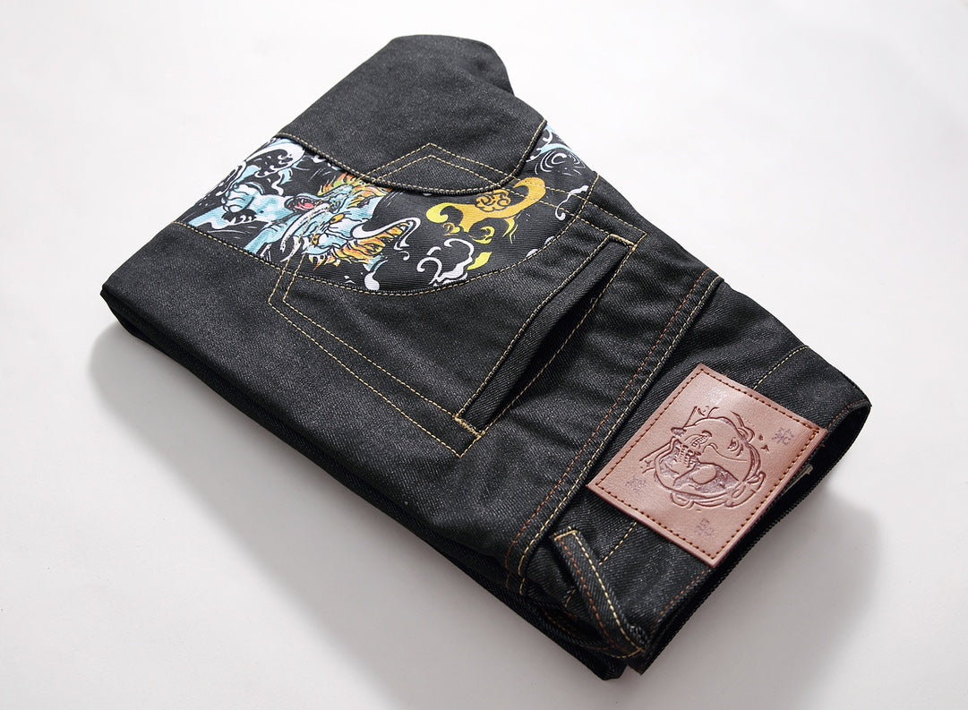 EVISU KURO Daicock Tiger & Foo Dog Print Appliqué Panel Jeans Wide Relaxed Fit Raw Selvedge Dark Indigo