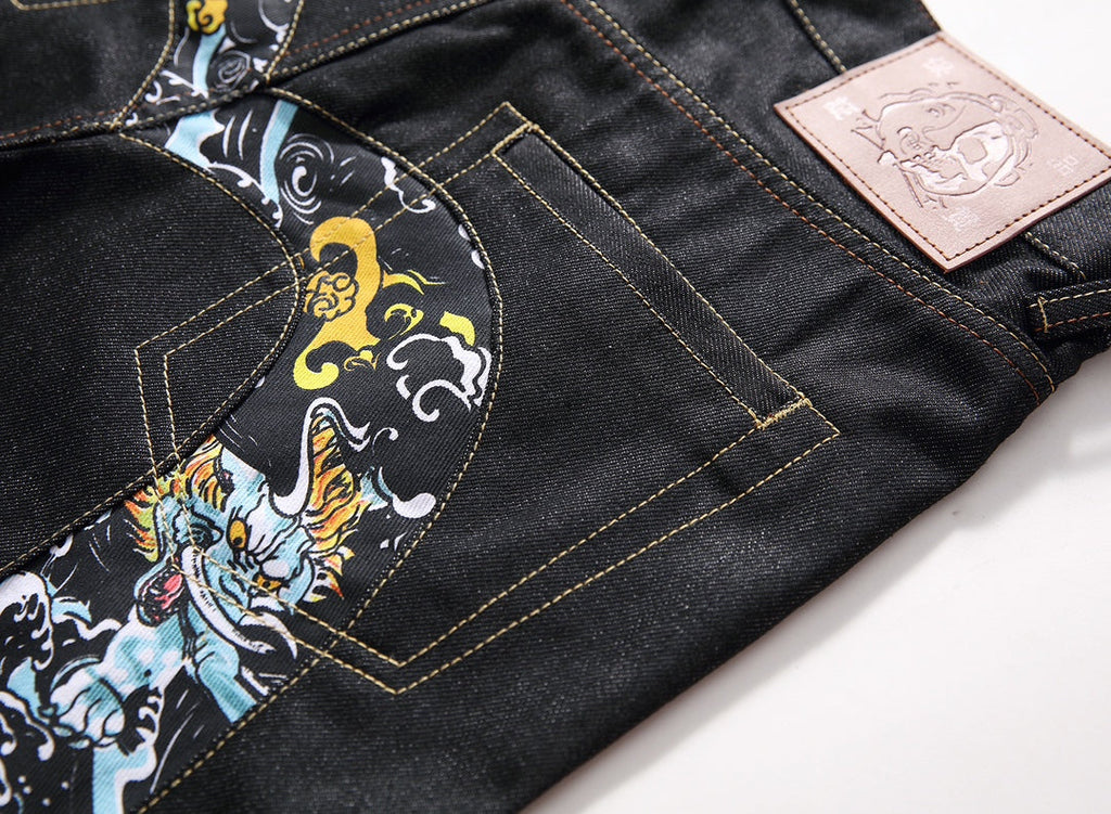 EVISU KURO Daicock Tiger & Foo Dog Print Appliqué Panel Jeans Wide Relaxed Fit Raw Selvedge Dark Indigo
